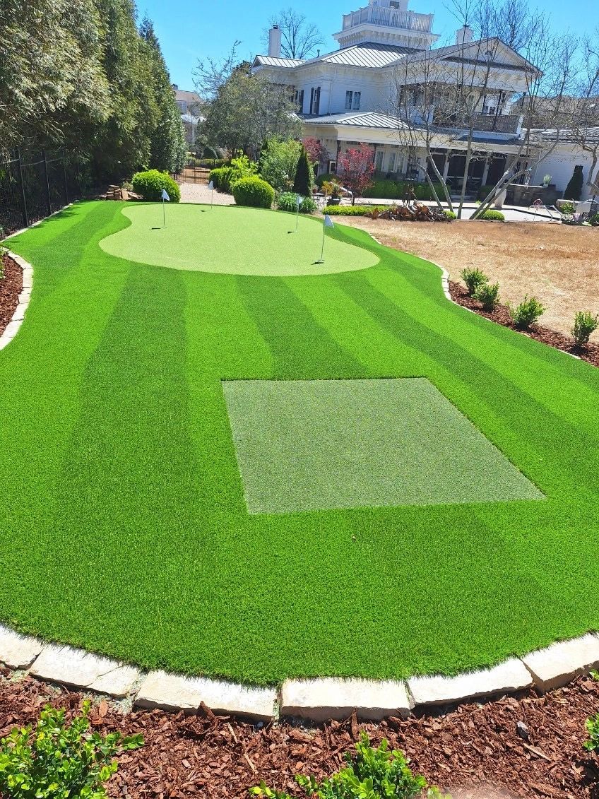 Custom residential putting green with flags